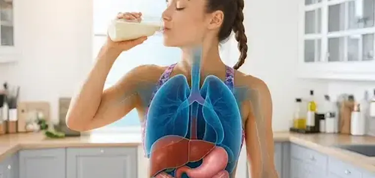 Runner refueling in the kitchen after a workout